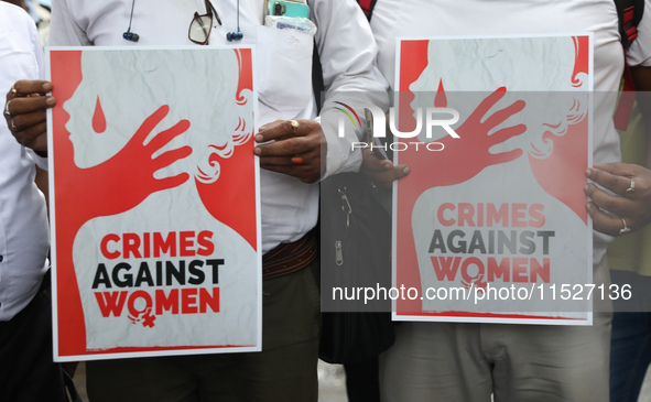 Government Sponsored Multipurpose School Taki House for Boys of Ex-Students and Ex-Teachers take part in a protest march in Kolkata, India,...