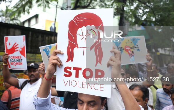 Government Sponsored Multipurpose School Taki House for Boys of Ex-Students and Ex-Teachers take part in a protest march in Kolkata, India,...