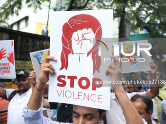 Government Sponsored Multipurpose School Taki House for Boys of Ex-Students and Ex-Teachers take part in a protest march in Kolkata, India,...