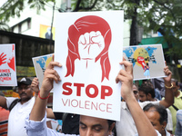 Government Sponsored Multipurpose School Taki House for Boys of Ex-Students and Ex-Teachers take part in a protest march in Kolkata, India,...