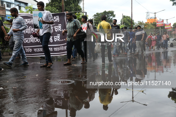 Government Sponsored Multipurpose School Taki House for Boys of Ex-Students and Ex-Teachers take part in a protest march in Kolkata, India,...