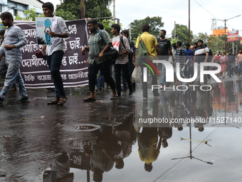 Government Sponsored Multipurpose School Taki House for Boys of Ex-Students and Ex-Teachers take part in a protest march in Kolkata, India,...