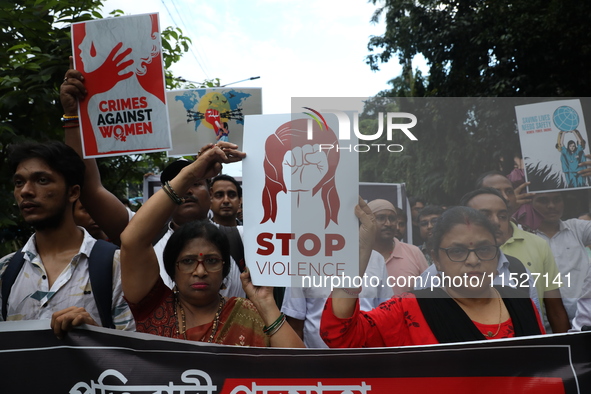 Government Sponsored Multipurpose School Taki House for Boys of Ex-Students and Ex-Teachers take part in a protest march in Kolkata, India,...