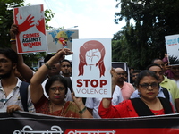 Government Sponsored Multipurpose School Taki House for Boys of Ex-Students and Ex-Teachers take part in a protest march in Kolkata, India,...