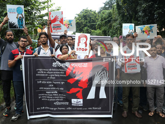 Government Sponsored Multipurpose School Taki House for Boys of Ex-Students and Ex-Teachers take part in a protest march in Kolkata, India,...