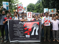 Government Sponsored Multipurpose School Taki House for Boys of Ex-Students and Ex-Teachers take part in a protest march in Kolkata, India,...