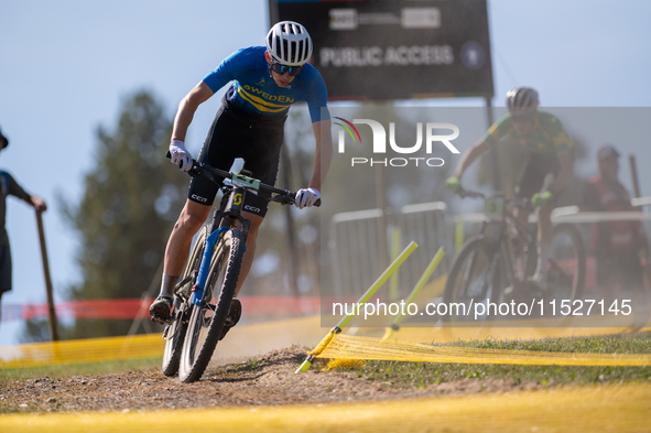 Sven Unger of Sweden participates in the UCI Mountain Bike World Championships Cross-Country Olympic Men Junior in Pal Arinsal, Andorra, on...