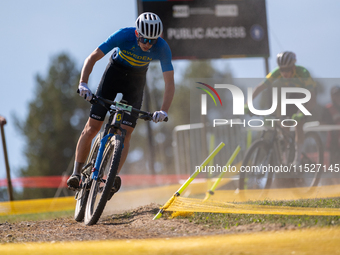 Sven Unger of Sweden participates in the UCI Mountain Bike World Championships Cross-Country Olympic Men Junior in Pal Arinsal, Andorra, on...