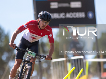 Julien Leclair of Canada participates in the UCI Mountain Bike World Championships Cross-Country Olympic Men Junior in Pal Arinsal, Andorra,...