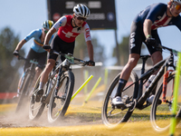 A cyclist participates in the UCI Mountain Bike World Championships Cross-Country Olympic Men Junior in Pal Arinsal, Andorra, on August 30,...