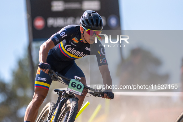 Aksel Gomez of Colombia participates in the UCI Mountain Bike World Championships Cross-Country Olympic Men Junior in Pal Arinsal, Andorra,...