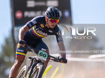 Aksel Gomez of Colombia participates in the UCI Mountain Bike World Championships Cross-Country Olympic Men Junior in Pal Arinsal, Andorra,...