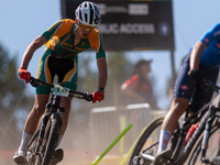 A cyclist participates in the UCI Mountain Bike World Championships Cross-Country Olympic Men Junior in Pal Arinsal, Andorra, on August 30,...