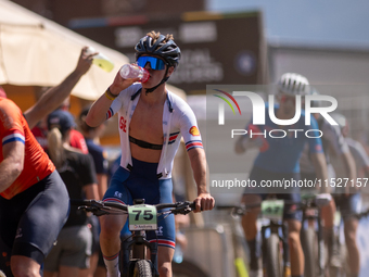 A cyclist participates in the UCI Mountain Bike World Championships Cross-Country Olympic Men Junior in Pal Arinsal, Andorra, on August 30,...