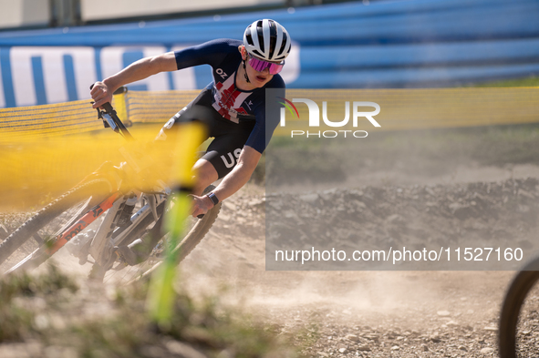 A cyclist participates in the UCI Mountain Bike World Championships Cross-Country Olympic Men Junior in Pal Arinsal, Andorra, on August 30,...