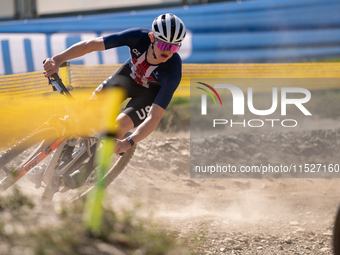 A cyclist participates in the UCI Mountain Bike World Championships Cross-Country Olympic Men Junior in Pal Arinsal, Andorra, on August 30,...