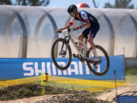 A cyclist participates in the UCI Mountain Bike World Championships Cross-Country Olympic Men Junior in Pal Arinsal, Andorra, on August 30,...