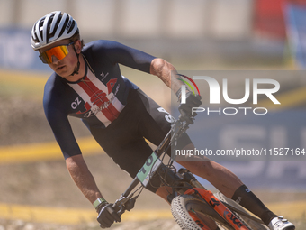 Roger Coote of the USA participates in the UCI Mountain Bike World Championships Cross-Country Olympic Men Junior in Pal Arinsal, Andorra, o...