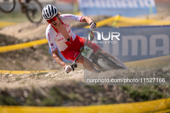 Hector Jaroslawski of Poland competes in the UCI Mountain Bike World Championships Cross-Country Olympic Men Junior in Pal Arinsal, Andorra,...