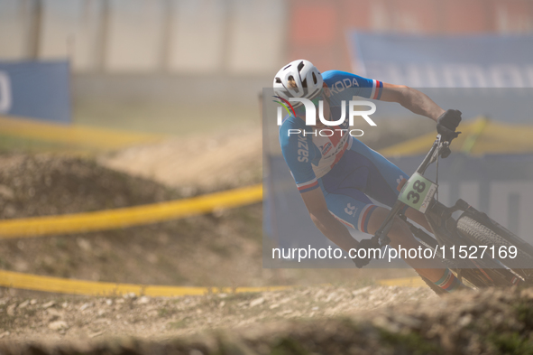 Peter Baant of Czechia participates in the UCI Mountain Bike World Championships Cross-Country Olympic Men Junior in Pal Arinsal, Andorra, o...