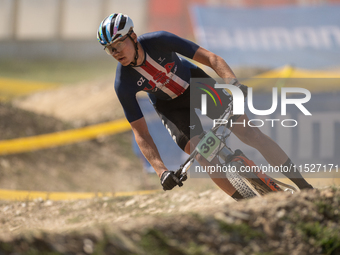 Mikhail Mosteller of UNITED competes in the UCI Mountain Bike World Championships Cross-Country Olympic Men Junior in Pal Arinsal, Andorra,...