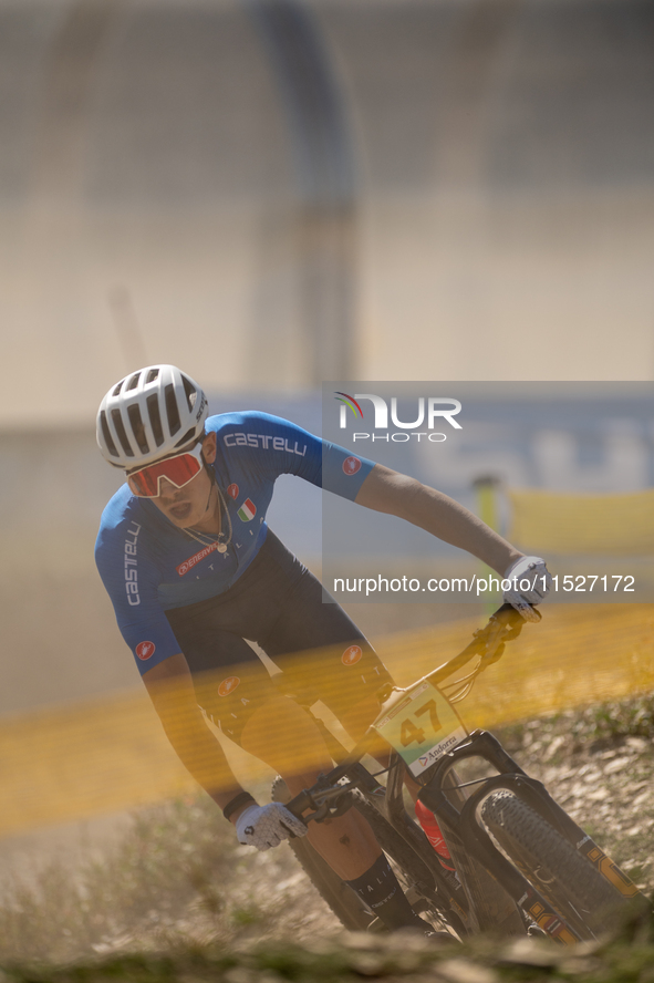 Guillermo Rial of Italy participates in the UCI Mountain Bike World Championships Cross-Country Olympic Men Junior in Pal Arinsal, Andorra,...