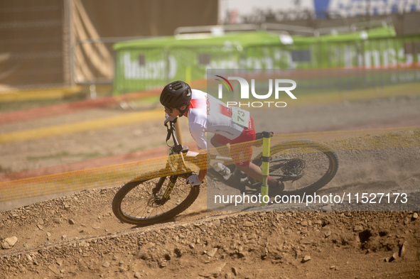 Alfred Hankus of Poland competes in the UCI Mountain Bike World Championships Cross-Country Olympic Men Junior in Pal Arinsal, Andorra, on A...