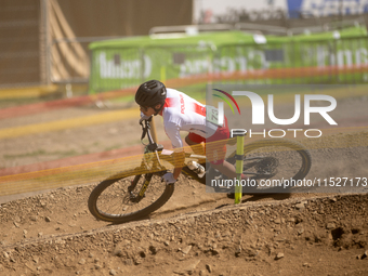 Alfred Hankus of Poland competes in the UCI Mountain Bike World Championships Cross-Country Olympic Men Junior in Pal Arinsal, Andorra, on A...