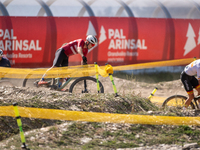 A cyclist participates in the UCI Mountain Bike World Championships Cross-Country Olympic Men Junior in Pal Arinsal, Andorra, on August 30,...