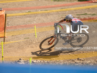 Roger Coote of the USA participates in the UCI Mountain Bike World Championships Cross-Country Olympic Men Junior in Pal Arinsal, Andorra, o...