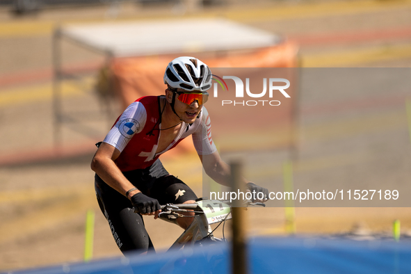 Anatol Alder of Switzerland competes in the UCI Mountain Bike World Championships Cross-Country Olympic Men Junior in Pal Arinsal, Andorra,...