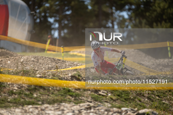 Hector Jaroslawski of Poland competes in the UCI Mountain Bike World Championships Cross-Country Olympic Men Junior in Pal Arinsal, Andorra,...