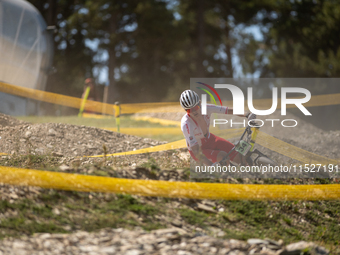 Hector Jaroslawski of Poland competes in the UCI Mountain Bike World Championships Cross-Country Olympic Men Junior in Pal Arinsal, Andorra,...