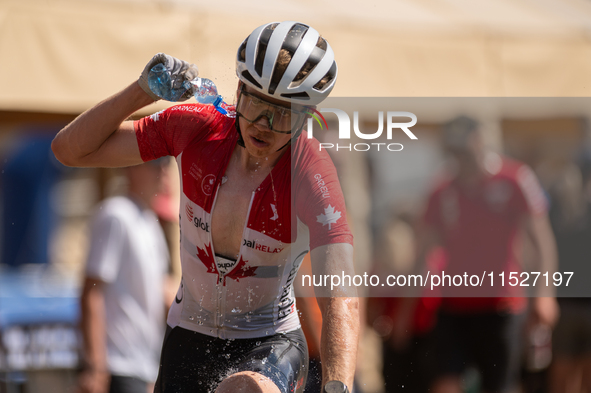 A cyclist participates in the UCI Mountain Bike World Championships Cross-Country Olympic Men Junior in Pal Arinsal, Andorra, on August 30,...