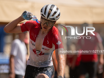 A cyclist participates in the UCI Mountain Bike World Championships Cross-Country Olympic Men Junior in Pal Arinsal, Andorra, on August 30,...