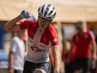 A cyclist participates in the UCI Mountain Bike World Championships Cross-Country Olympic Men Junior in Pal Arinsal, Andorra, on August 30,...