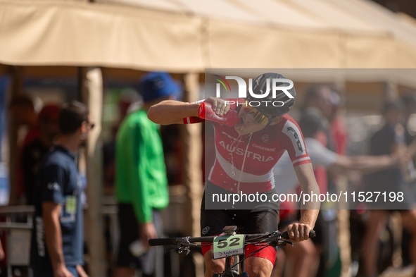 Tristan Barret of Alfred competes in the UCI Mountain Bike World Championships Cross-Country Olympic Men Junior in Pal Arinsal, Andorra, on...