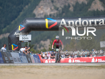 Albert Philipsen of Denmark wins the final race in the UCI Mountain Bike World Championships Cross-Country Olympic Men Junior in Pal Arinsal...