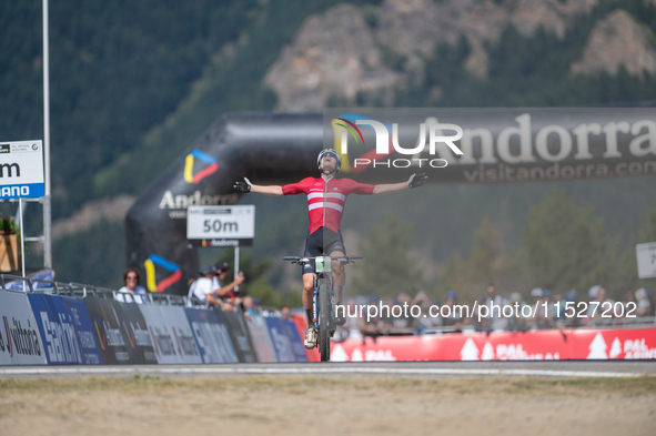 Albert Philipsen of Denmark wins the final race in the UCI Mountain Bike World Championships Cross-Country Olympic Men Junior in Pal Arinsal...