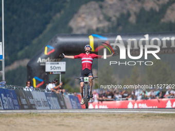 Albert Philipsen of Denmark wins the final race in the UCI Mountain Bike World Championships Cross-Country Olympic Men Junior in Pal Arinsal...