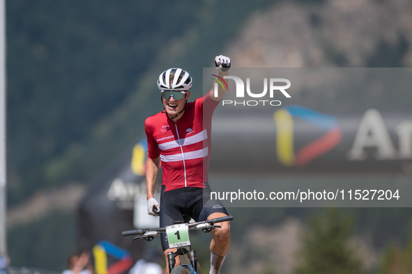 Albert Philipsen of Denmark wins the final race in the UCI Mountain Bike World Championships Cross-Country Olympic Men Junior in Pal Arinsal...