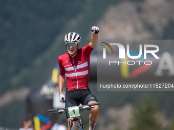 Albert Philipsen of Denmark wins the final race in the UCI Mountain Bike World Championships Cross-Country Olympic Men Junior in Pal Arinsal...