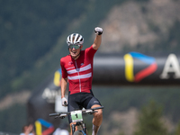 Albert Philipsen of Denmark wins the final race in the UCI Mountain Bike World Championships Cross-Country Olympic Men Junior in Pal Arinsal...