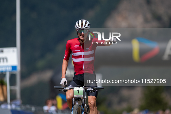 Albert Philipsen of Denmark wins the final race in the UCI Mountain Bike World Championships Cross-Country Olympic Men Junior in Pal Arinsal...