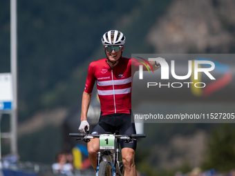 Albert Philipsen of Denmark wins the final race in the UCI Mountain Bike World Championships Cross-Country Olympic Men Junior in Pal Arinsal...