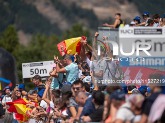 Spanish fans celebrate third place in the UCI Mountain Bike World Championships Cross-Country Olympic Men Junior in Pal Arinsal, Andorra, on...