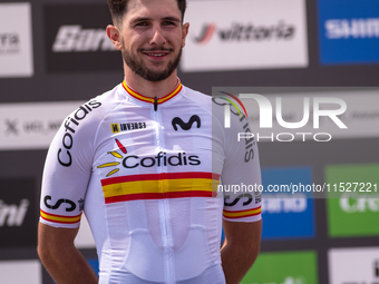 Nicolas Franco of Spain celebrates on the podium for third place in the UCI Mountain Bike World Championships Cross-Country Olympic Men Juni...