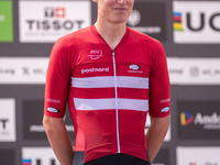 In Pal Arinsal, Andorra, on August 30, 2024, Nicolas Philipsen of Denmark celebrates on the podium for third place in the UCI Mountain Bike...