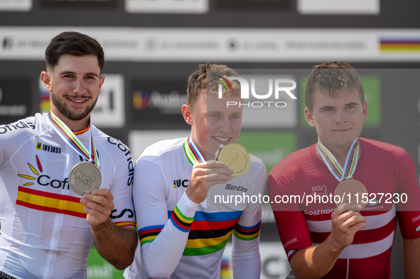 In Pal Arinsal, Andorra, on August 30, 2024, Nicolas Philipsen of Denmark, Nicolas Franco of Spain, and Henrique Hougs of Denmark celebrate...