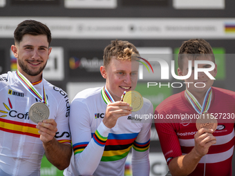 In Pal Arinsal, Andorra, on August 30, 2024, Nicolas Philipsen of Denmark, Nicolas Franco of Spain, and Henrique Hougs of Denmark celebrate...